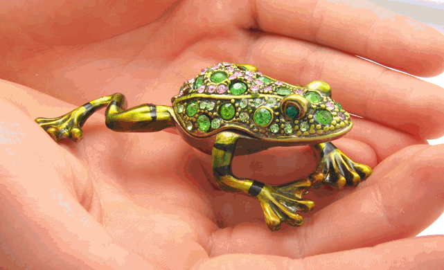 Green Frog Cremation Keepsake shown in hands